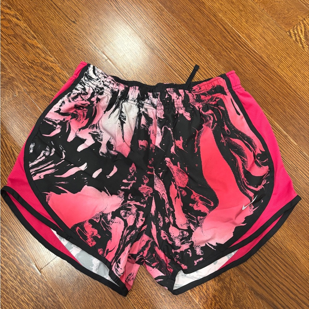 Medium pink and black Nike shorts